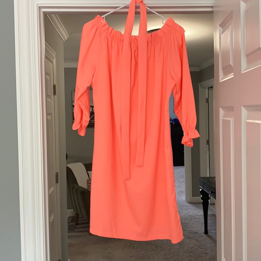 Off shoulder or like boat neck hot orange dress